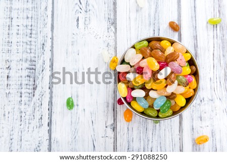Colorfull Jelly Beans (close-up shot) on bright wooden background