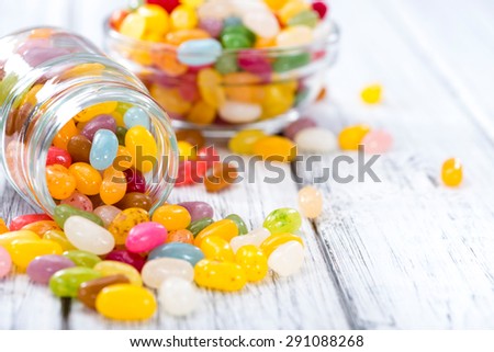 Colorfull Jelly Beans (close-up shot) on bright wooden background