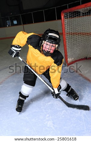 7 Year old Hockey Player in uniform.