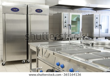 Empty restaurant kitchen with professional equipment