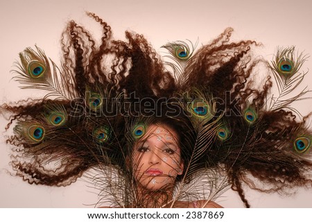 feathers for hair. feathers in her hair