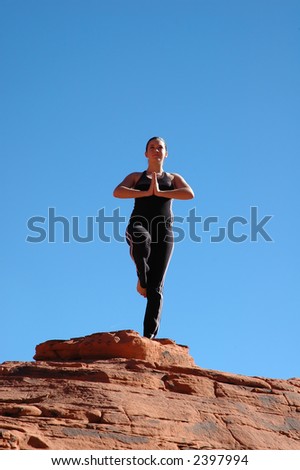 A girl doing yoga in Red Rock Canyon, Las Vegas Nevada