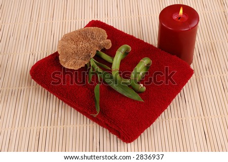 Towel, bamboo, candle and dry mushroom in a  spa