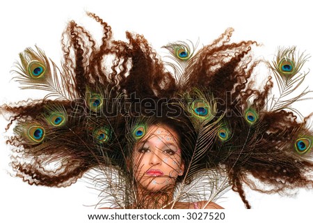 eye makeup with feathers. Girl wearing makeup made