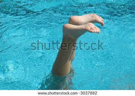 Pruned feet out of water (swimmer enjoying herself)