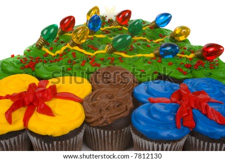 Christmas cupcakes in the shape of Christmas tree and gifts