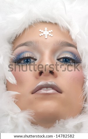 eye makeup with feathers. make up, white feathers