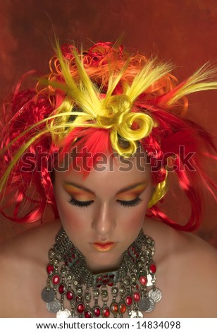 Girl with red, orange, yellow hair and beautiful make up