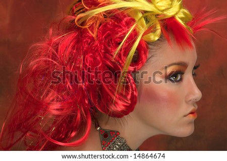 Girl with red, orange, yellow hair and beautiful make up