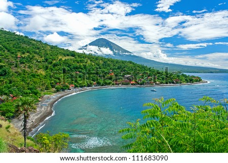 Agung volcano is the highest mountain on Bali island, Indonesia.  It is still active and located near Amed -- a small village on the northeast of Bali.