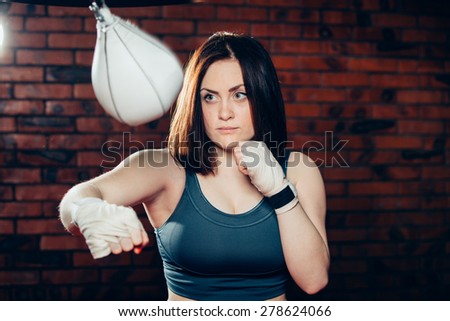 Young woman boxing workout on the gym