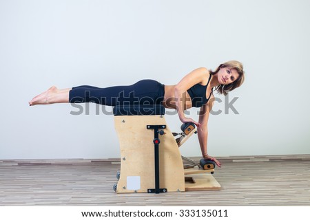 combo wunda pilates chair woman fitness yoga gym exercise.