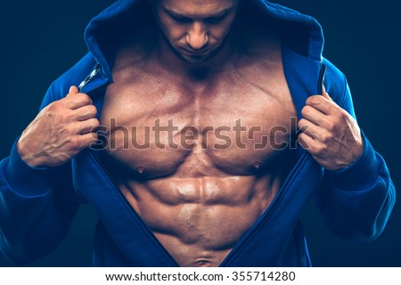 Man with muscular torso. Strong Athletic Man Fitness Model Torso showing six pack abs
