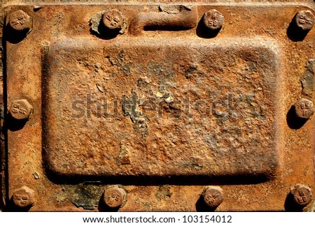 Old rusty metal cover