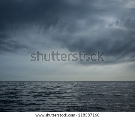 Rainy clouds over an ocean