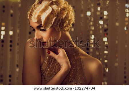 Elegant Blond Retro Woman In Golden Dress With Beautiful Hairdo And Red Lipstick