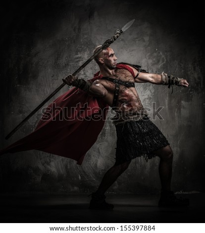 Wounded Gladiator In Red Coat Throwing Spear