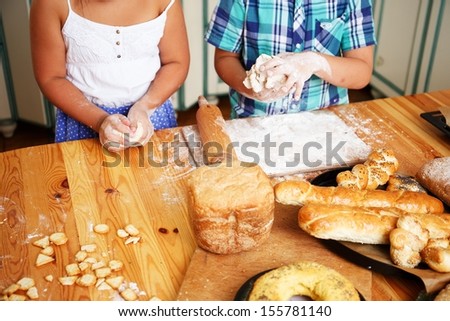 Children cooking homemade pastry
