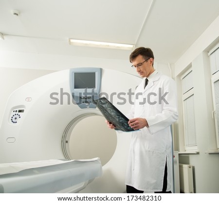 Doctor looking at the computed tomography results