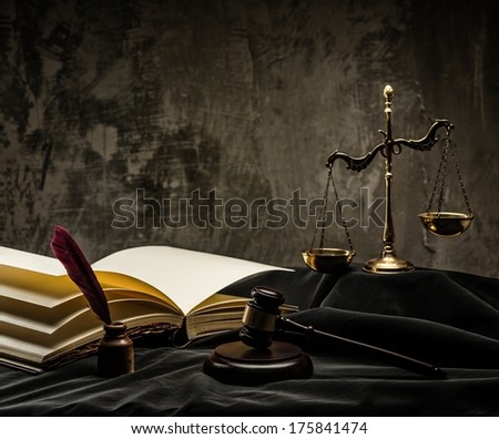 Scales and wooden hammer on judge's mantle Scales and wooden hammer on judge's mantle