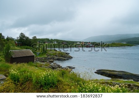 Traditional scandinavian houses near water in Norway