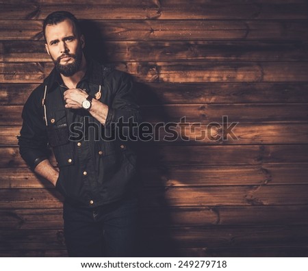 Handsome man with beard  wearing waxed canvas jacket