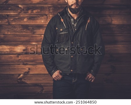 Man with beard  wearing waxed canvas jacket