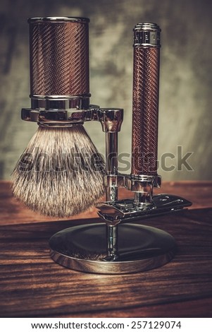 Safety razor and shaving brush on a stand