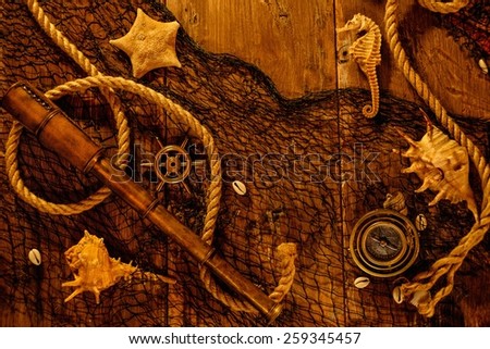 Sea concept on a wooden table background