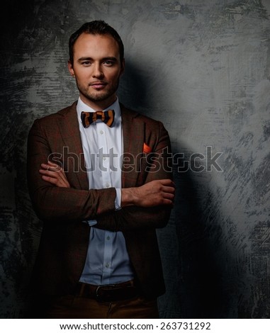 Sharp dressed fashionist wearing jacket and bow tie