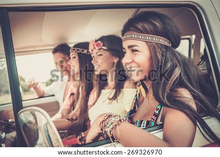 Multi-ethnic hippie friends on a road trip