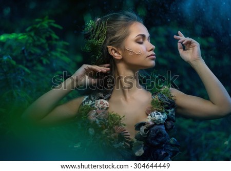 Elf woman in a magical forest