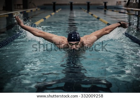 Man swims using breaststroke technique