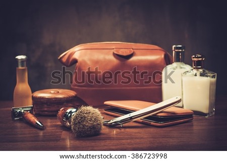 Gentleman\'s accessories on a luxury wooden board