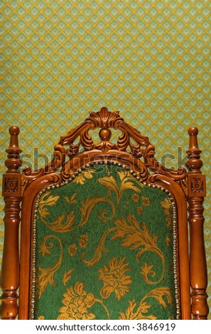 Luxury royal chair on abstract fabric background