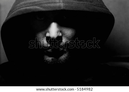 Monochrome picture of a guy in a hood