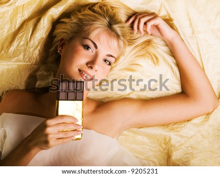 Beautiful girl with a chocolate craving close-up portrait