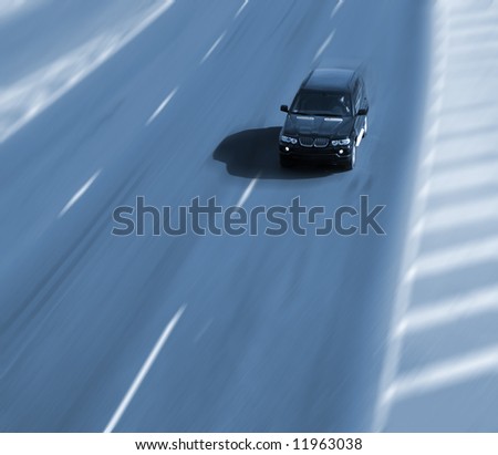 Fast driving car on a highway
