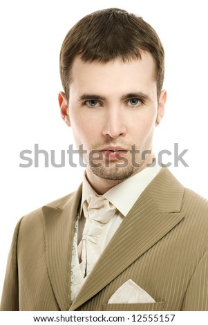 stock photo Handsome young groom in wedding suit over white background