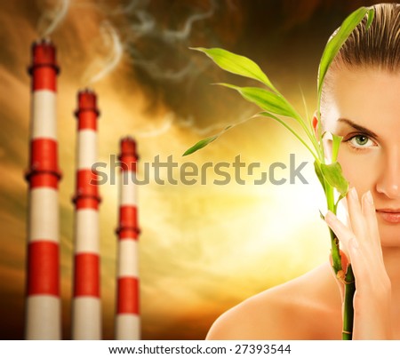 Young woman with green plant. Global warming concept