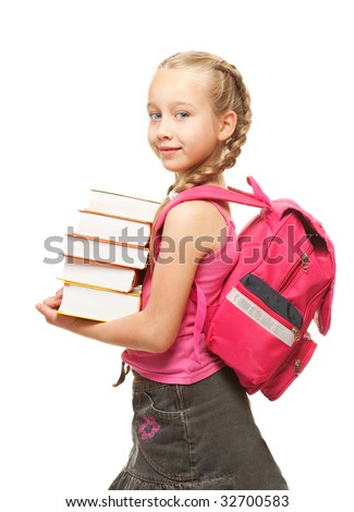 stock photo Happy little schoolgirl with a stack of heavy books