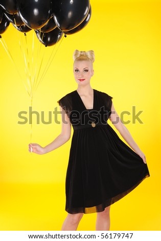 Lovely lady with black balloons