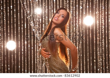 Beautiful brunette in a night club