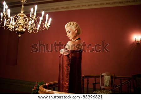 stock photo : Blond woman in evening dress.