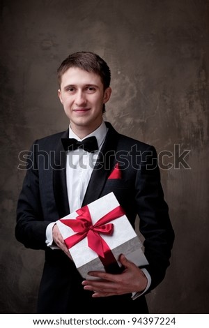 Young man with a gift box.