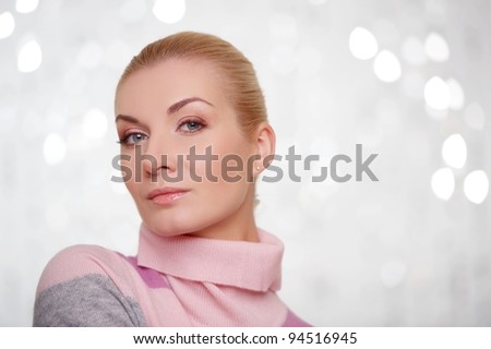 Beautiful woman in cashmere sweater portrait.