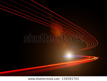 car light trails in tunnel. Art image . Long exposure photo taken in a tunnel