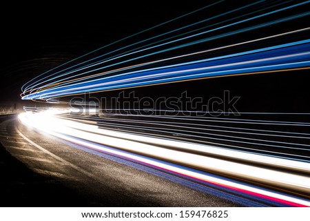 Truck Light Trails In Tunnel. Art Image . Long Exposure Photo Taken In A Tunnel