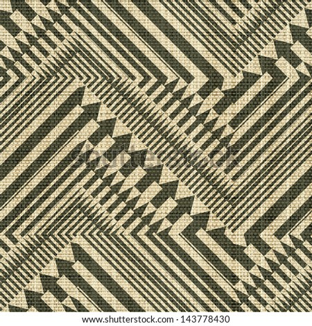 Abstract geometric ornament printed on textured linen canvas fabric background. Seamless pattern.