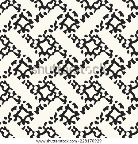 Abstract rough shapes spot ornament in black and white. seamless pattern.